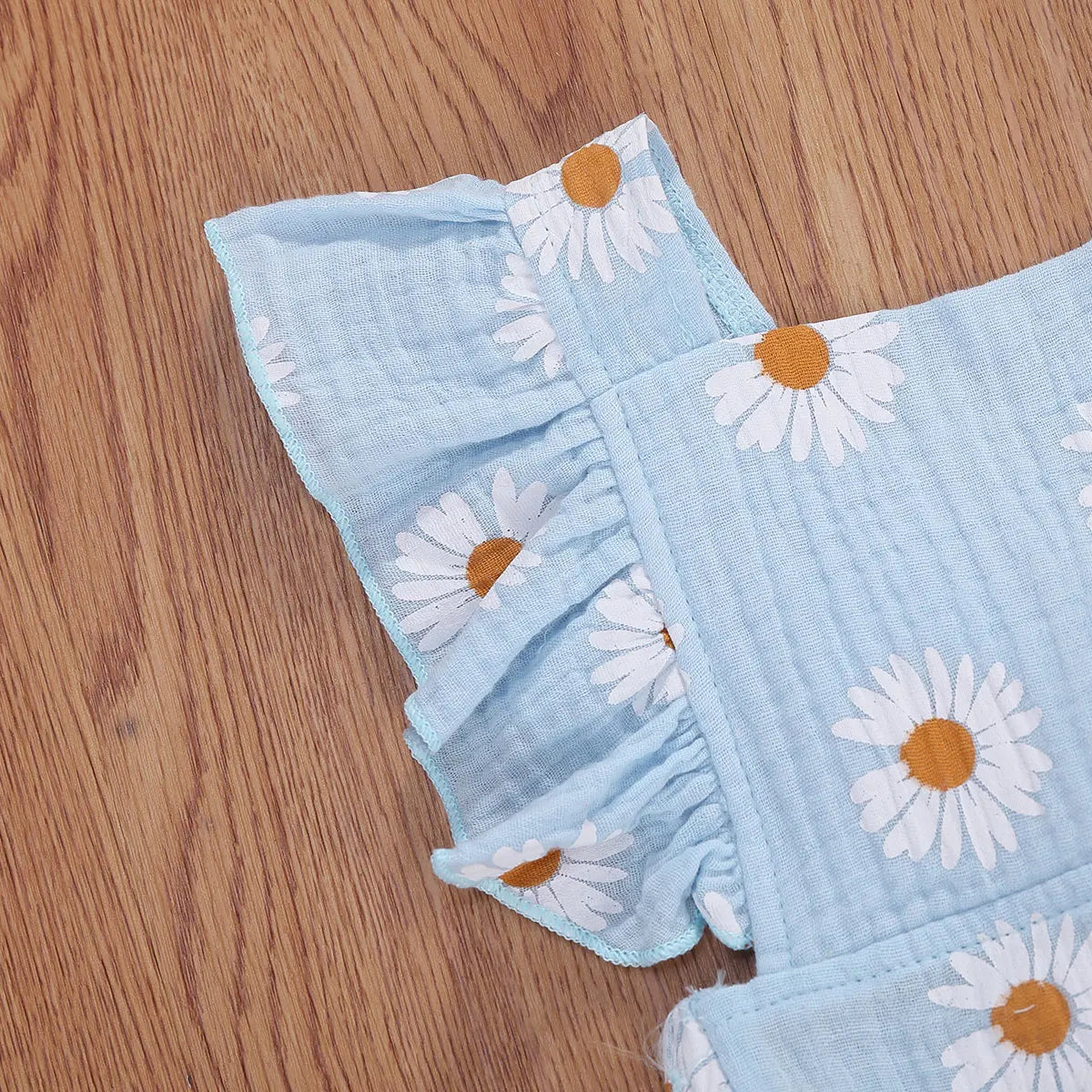 Barboteuse mignonne motif marguerites