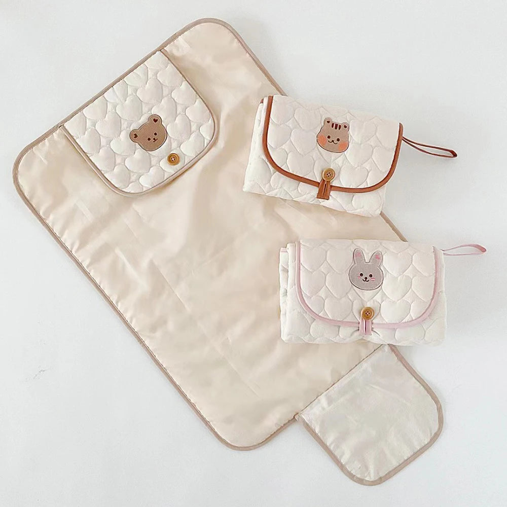 Matelas à langer pliable et portable