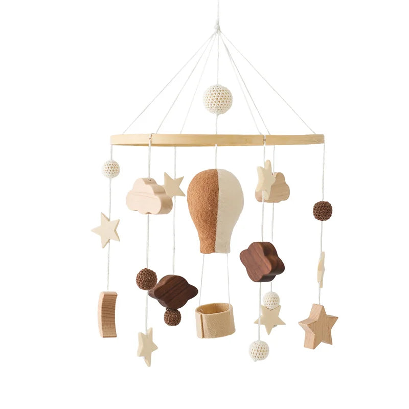 Mobile pour berceau en bois avec clochette