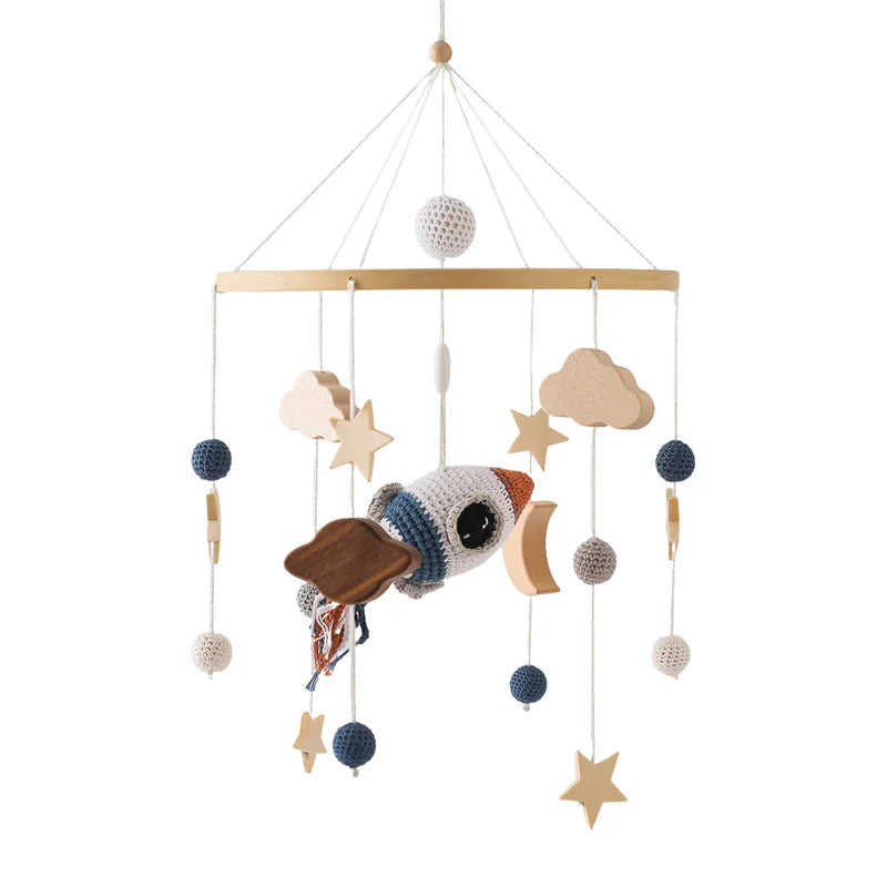 Mobile pour berceau en bois avec clochette