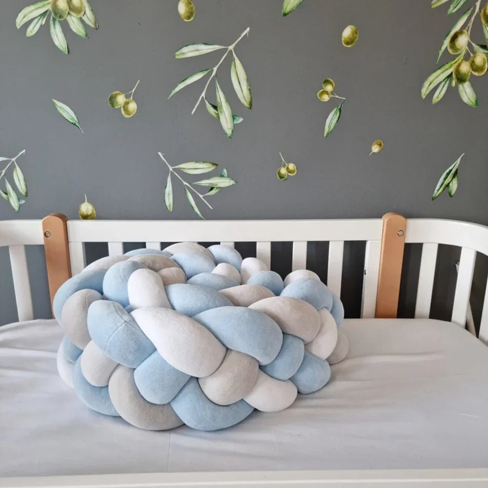 Coussin tressé pour lit